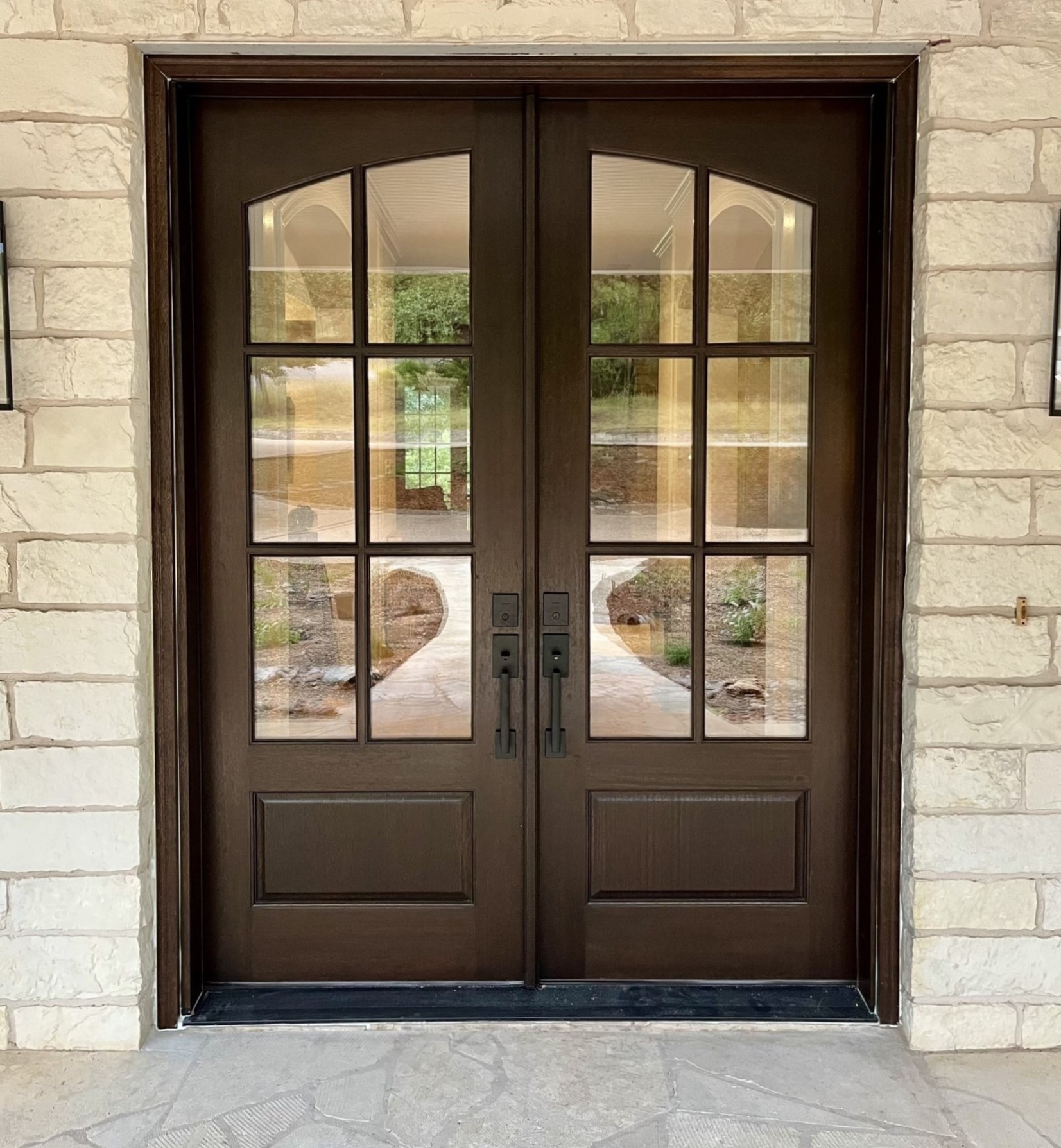 Custom double front door installed by Top to Bottom Doors